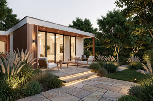 Terrasse contemporaine reliant une maison lumineuse à un jardin végétalisé, avec des matériaux naturels, du mobilier épuré et un éclairage doux.